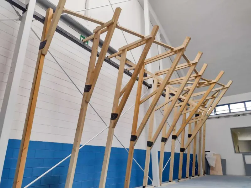 Walltopia Boulder climbing walls with wooden support structure in Rockspot in Milan, Italy