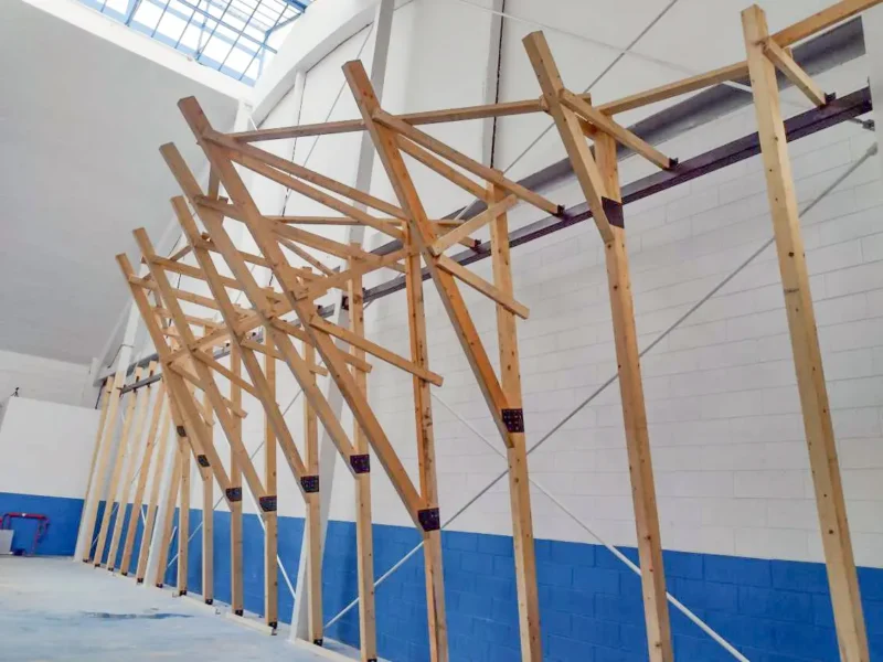 Walltopia Boulder climbing walls with wooden support structure in Rockspot in Milan, Italy