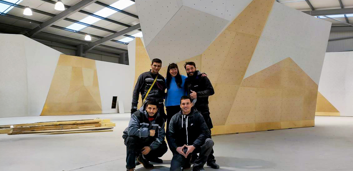 Walltopia boulder climbing walls with natural wood panels and wooden support structure in Boulder World Belfast, Northern Ireland
